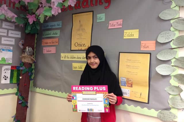 ZamZam with her certificate.