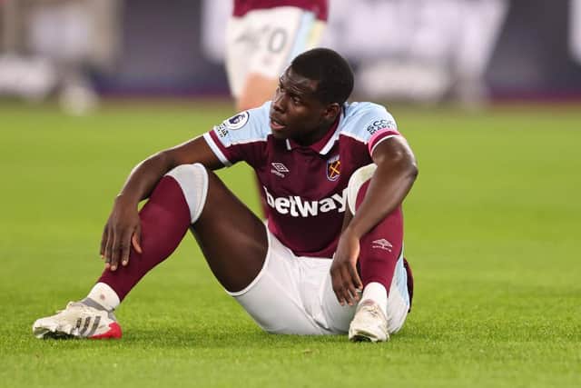 Kurt Zouma of West Ham United looks dejected after  the Premier League match between West Ham United and Watford at London Stadium on February 8, 2022 in London, United Kingdom. (Photo by Marc Atkins/Getty Images)