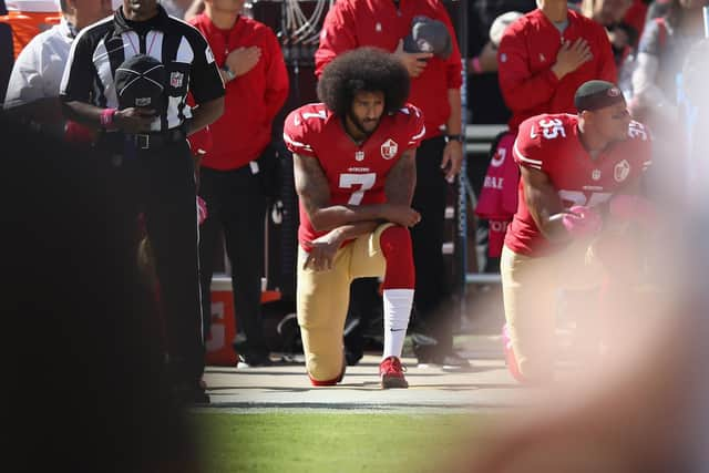 In the 2016 pre-season, San Francisco quarter-back Colin Kaepernick took a knee during the national anthem as opposed to the tradition of standing. It was the start of a protest movement that spread throughout the NFL. The protest drew stinging criticism and led to his departure from the 49ers.