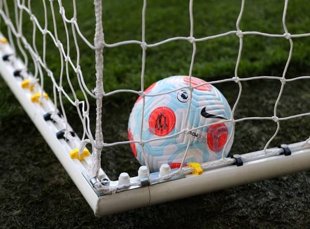 The Nike Flight Premier League match ball in the goal  (Photo by Catherine Ivill/Getty Images)