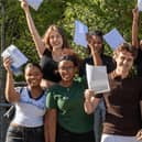 The Elms Academy students celebrate their results.