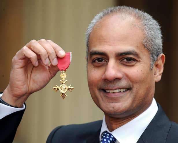 George Alagiah at Buckingham Palace after collecting his OBE from the Queen.