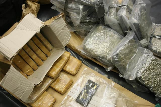 Part of a massive seizure of heroin and arms by Gardai forensic officers in Dublin's Garda Technical Bureau headquarters.