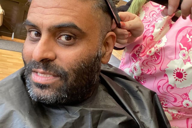 Haresh Sood getting hair cut for wigs.