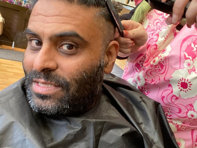 Haresh Sood getting hair cut for wigs.
