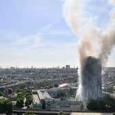 Smoke billows from a fire that engulfed the 24-storey Grenfell Tower in west London in 2017.