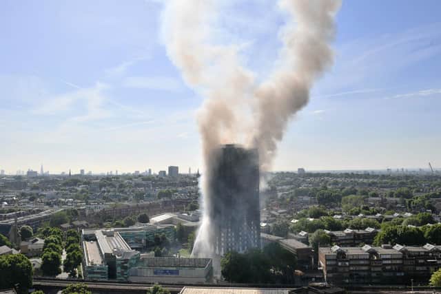 Smoke billows from a fire that engulfed the 24-storey Grenfell Tower in west London in 2017.