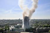 Smoke billows from a fire that engulfed the 24-storey Grenfell Tower in west London in 2017.