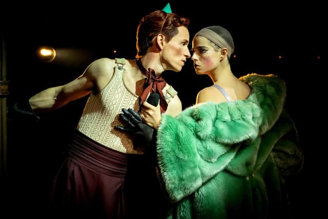 Eddie Redmayne as The Emcee and Jessie Buckley as Sally Bowles in Cabaret