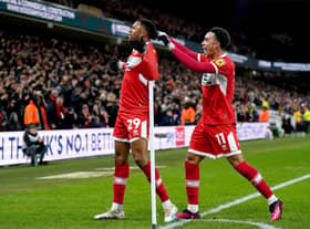 Middlesbrough's Chuba Akpom (left) celebrates scoring their side's first goal of the game during the Sky Bet Championship match at the Riverside Stadium, Middlesbrough. Picture date: Tuesday March 14, 2023. PA Photo. See PA story SOCCER Middlesbrough. Photo credit should read: Owen Humphreys/PA Wire.RESTRICTIONS: EDITORIAL USE ONLY No use with unauthorised audio, video, data, fixture lists, club/league logos or "live" services. Online in-match use limited to 120 images, no video emulation. No use in betting, games or single club/league/player publications.