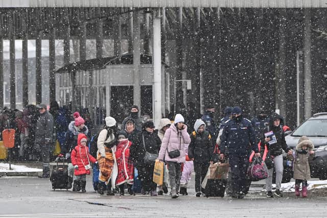 Many Ukrainian refugees have been given help and shelter, but human traffickers have also sought to exploit their situation (Picture: Daniel Mihailescu/AFP via Getty Images)