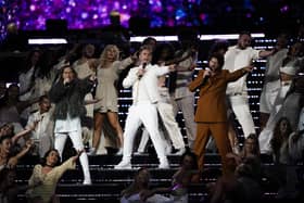 (left to right) Mark Owen, Gary Barlow and Howard Donald from Take That will be touring the country next year.