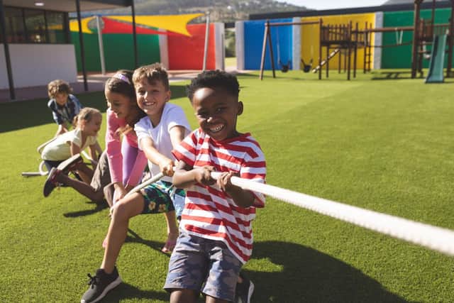 Children Playing Tug of War