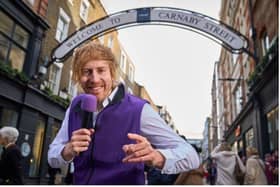 Award winning comedian Mark Simmons on Carnaby Street performing jokes from Plum's 'Improv' Your Finances Joke Book