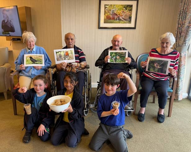 Care UK’s Buchanan Court residents Trish Haley, John Goodall, Lynda Hatfield and Pragji Solanki were joined by the children from St Georges School for RSPB Big Garden Birdwatch