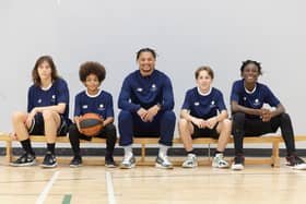 Greenhouse participants with a coach.