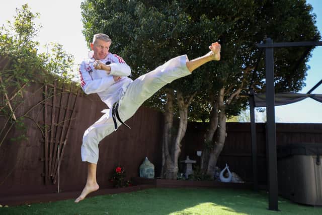 World karate champion Dave Treadwell, a 6th Dan black belt, restrained a suspected car thief outside his home in Bishopston. (Anita Maric / SWNS)
