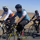 H&K Cycling Club Riders in Saudi Arabia Desert