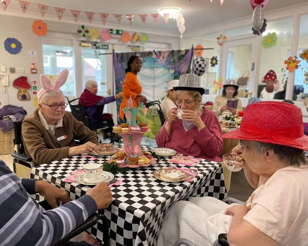 Residents Margaret, Valerie, Albert and Sally at HC-One’s Capwell Grange Care Home enjoying their Mad Hatter’s themed tea party in celebration of National Tea Party Day