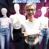 Kidney donor, John Burns, stands in a shop window at Bluewater Shopping Centre in Kent