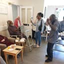 Resident Denis Young at HC-One’s Alexander Care Home with fellow residents and colleagues celebrating his birthday