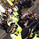 Just Stop Oil supporters lying on the ground during London road blockades.