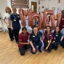 Monica Friend (Healthcare Assistant), Tara Dorritt (Clinical Lead – Cancer Services), Sabrina Sehajpal (Registered Nurse), Andreeasilvia Pirsa (Sister – Charge Nurse), Karandeep Mann (Registered Nurse), Carolyn Bundalian (Specialist Nurse), Helen Tyrrell (Clinical Services Manager), Silvia Agyare (Senior Registered Nurse) and Lidia Deoliveria (Health Care Assistant) at Bishops Wood Hospital celebrating being awarded the MQEM  for their Oncology department.