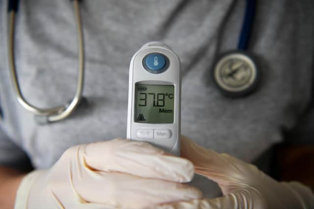 File photo dated 14/03/20 of a body temperature of 37.8 degrees Celsius is recorded on a tympanic thermometer. The UK Health Security Agency (UKHSA) has issued back-to-school advice amid high levels of flu, Covid-19 and invasive Strep A disease (iGas). The advice includes simple steps that can minimise the spread of illness in education and childcare settings as well as the wider community. Issue date: Monday January 2, 2023.