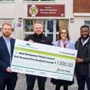 From left to right: Mark Doyle, Joe Allington, Rosie Williamson (West Wimbledon School headteacher) and Jeancy Nsombo