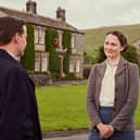 Filming has started in the Yorkshire Dales for Series 6 of All Creatures Great And Small, although as yet, cast and crew have not been spotted in their usual fliming locations. In this scene from series four, right to left, James Herriot (Nicholas Ralph) is with Mrs Hall (Anna Madeley) and Siegfried Farnon (Samuel West). Picture: Channel 5, Playground, Helen Williams