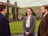 Filming has started in the Yorkshire Dales for Series 6 of All Creatures Great And Small, although as yet, cast and crew have not been spotted in their usual fliming locations. In this scene from series four, right to left, James Herriot (Nicholas Ralph) is with Mrs Hall (Anna Madeley) and Siegfried Farnon (Samuel West). Picture: Channel 5, Playground, Helen Williams