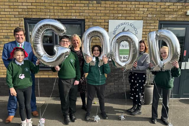 Kedleston Brookways School Headteacher Richard Gadd along with pupils and colleagues celebrate their recent Ofsted success.