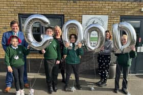 Kedleston Brookways School Headteacher Richard Gadd along with pupils and colleagues celebrate their recent Ofsted success.