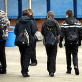 Pupils at Heath Park Business and Enterprise College, Wolverhampton, which has been named England's most improved school, according to league tables.