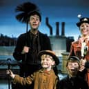 Mary Poppins starring Dick Van Dyke, as Bert, Julie Andrews, as Mary Poppins, and the Banks children