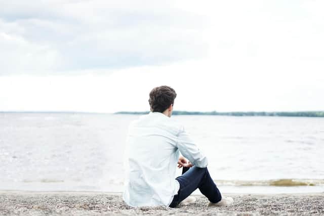 Man resting on a beach