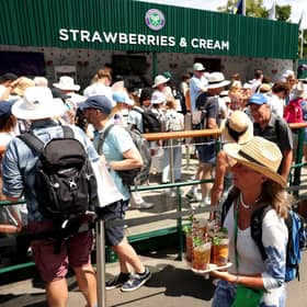 LONDON, ENGLAND - JULY 04: Spectators queue up for strawberries and cream on day five of The Championships Wimbledon 2025 at All England Lawn Tennis and Croquet Club on July 04, 2025 in London, England. (Photo by Ezra Shaw/Getty Images)