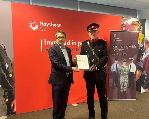 Raytheon UK managing director and CEO, James Gray, receiving the Gold Employee Recognition Scheme award by the Ministry of Defence from His Majesty's Deputy Lord Lieutenant Ian Twinley MBE