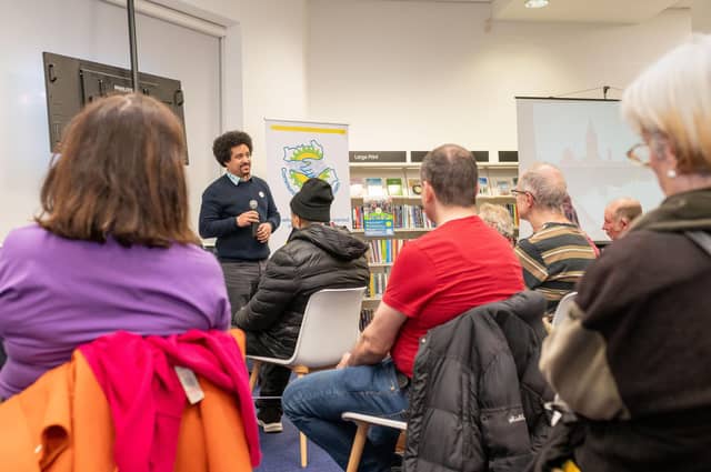 Dave Fuller, communities and business development director at Repowering London, tells locals how solar power can create revenue and build community skills