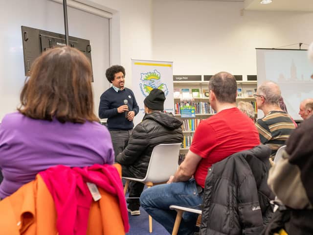 Dave Fuller, communities and business development director at Repowering London, tells locals how solar power can create revenue and build community skills