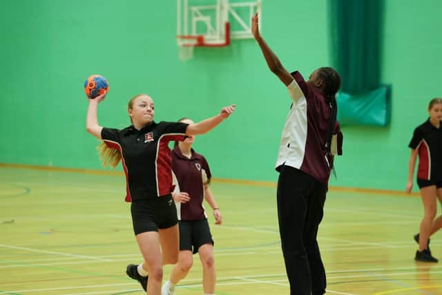 Girls playing Handball.