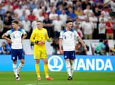 England's John Stones, goalkeeper Jordan Pickford and Declan Rice during the FIFA World Cup Quarter-Final match at the Al Bayt Stadium in Al Khor, Qatar. Picture: Nick Potts/PA Wire.