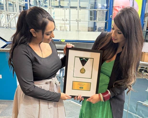 Dame Mary Perkins Award. (Left to right) Bhavisha Patel, Optometrist Director and Karina Peshawaria, Retail Director of Specsavers New Malden.