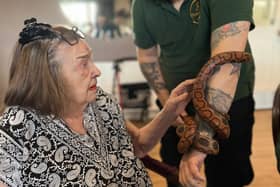 Robbie from Wild Science introducing another slithery snake to our residents