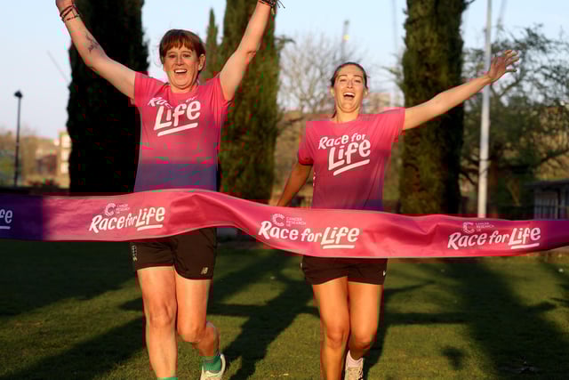 Paula and friend Danielle recreate the finish line feeling at Race for Life