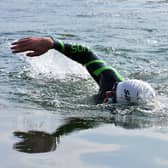 Open water swimming at Canary Wharf. 