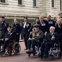 Marching past the Churchill War Rooms on the way back to Horseguard’s Parade Ground on Remembrance Sunday. Bill is in the middle.