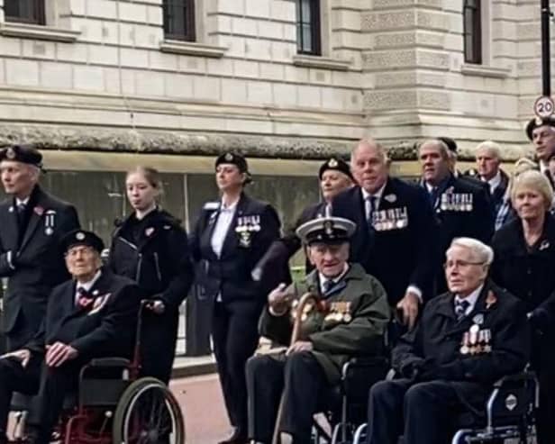 Marching past the Churchill War Rooms on the way back to Horseguard’s Parade Ground on Remembrance Sunday. Bill is in the middle.