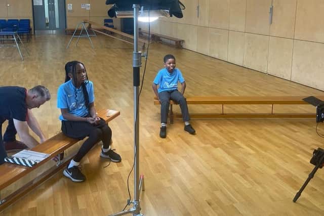 Pupils filming for Premier League Primary Stars