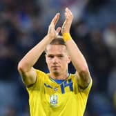 Mykhailo Mudryk of Ukraine applauds at the final whistle during the FIFA World Cup Qualifier between Scotland and Ukraine at Hampden Park on June 1, 2022 in Glasgow, Scotland. (Photo by Mark Runnacles/Getty Images)